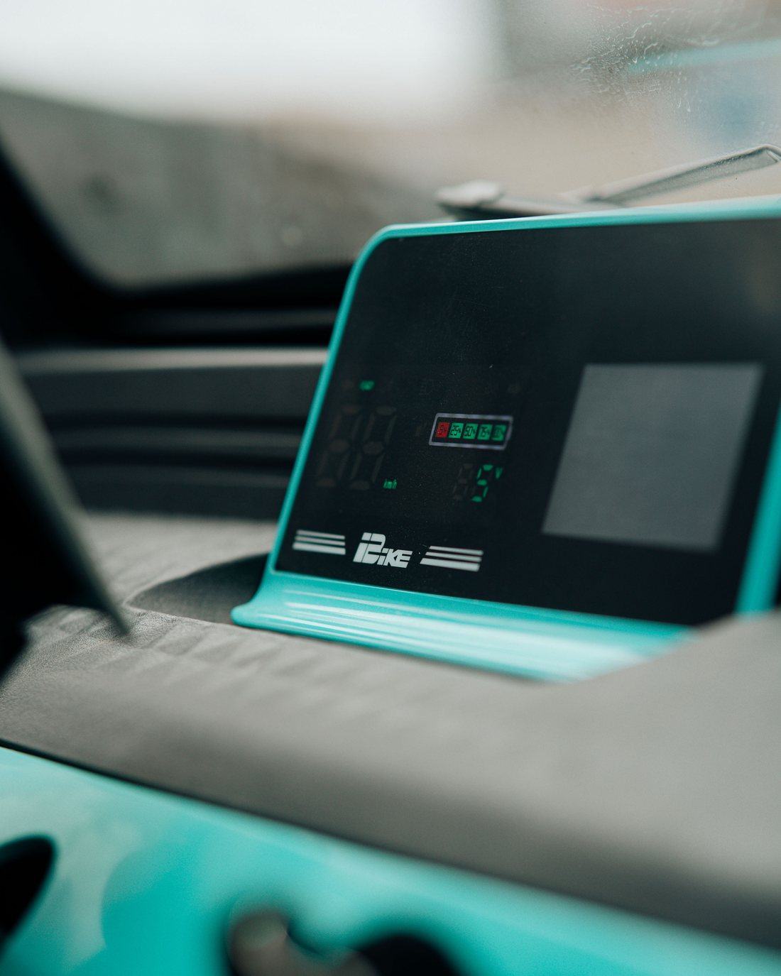Close-up of the ignition key and switch panel on a Mobility Ventures vehicle dashboard.