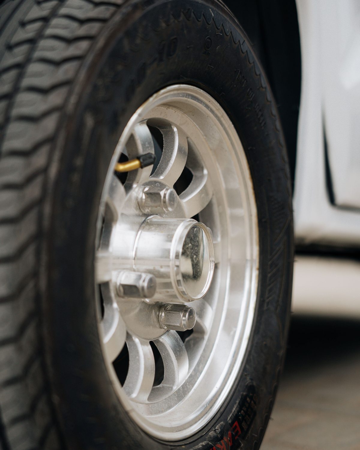 Close-up of a vehicle wheel, representing after-sales servicing.